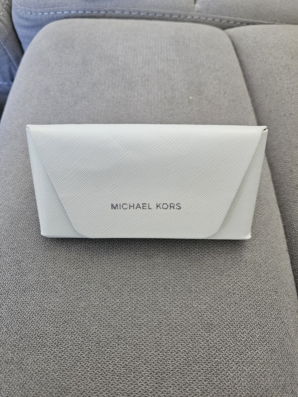 Michael Kors white hard shell case for glasses